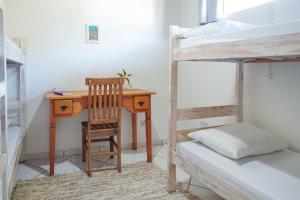 Casa delas Ilhabela客房内的一张或多张床位