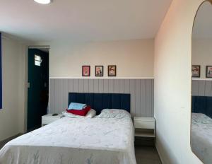 Ένα ή περισσότερα κρεβάτια σε δωμάτιο στο Porto de Galinhas, Serrambi, piscina, mar a 250m +16 φωτογραφίες