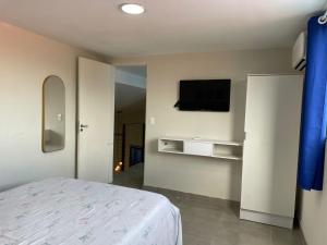 Μια τηλεόραση ή/και κέντρο ψυχαγωγίας στο Porto de Galinhas, Serrambi, piscina, mar a 250m