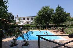 The swimming pool at or close to La Masseria
