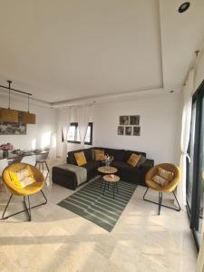 Posezení v ubytování Duplex de Luxe avec Vue Mer a Zenata City-Eco