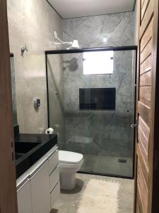 Ένα μπάνιο στο Alphaville Pousada e Hostel