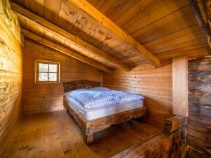 Letto o letti in una camera di EAGGA-Niederleger Alm