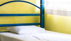 Postel nebo postele na pokoji v ubytování Casa de Don Pablo Hostel