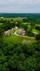 an aerial view of a house in the middle of a field at The Lookout House at The Bluebird in Eureka Springs