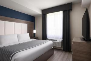 Voodi või voodid majutusasutuse Best Western Plus Gateway to the Falls toas