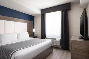 Voodi või voodid majutusasutuse Best Western Plus Gateway to the Falls toas