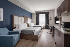Voodi või voodid majutusasutuse Best Western Plus Gateway to the Falls toas