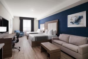 Voodi või voodid majutusasutuse Best Western Plus Gateway to the Falls toas