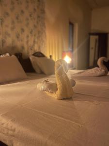 Postel nebo postele na pokoji v ubytování Weeragiri home stay