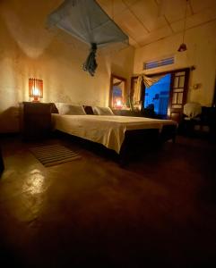 Postel nebo postele na pokoji v ubytování Weeragiri home stay