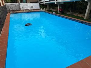 Piscina di Cozy studio in amazing Manatí with AC, WiFi, Pool o nelle vicinanze