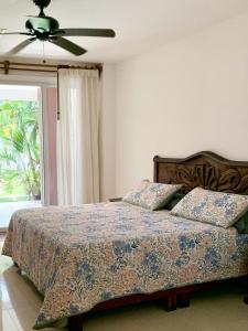 Katil atau katil-katil dalam bilik di Palmar Condominium 1C - Ocean front - Garden level