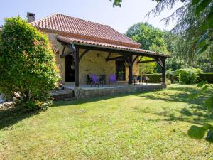 Zahrada ubytování Charmante maison en pierre au cœur du Périgord Noir avec jardin, cheminée et équipements pour bébé - FR-1-616-100