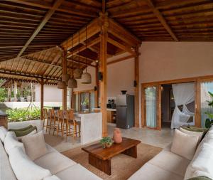 Et opholdsområde på Tebola Joglo Villas