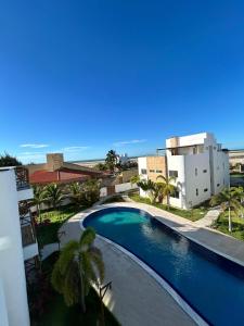 a view of a swimming pool from a building at Condomínio Vila do Mar in Luis Correia