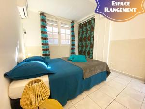 Voodi või voodid majutusasutuse Piscine et Vue Mer - F2 Cosy - Anse à l'Âne, 3-Îlets - Plage 5 min toas
