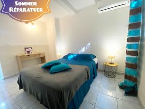 Voodi või voodid majutusasutuse Piscine et Vue Mer - F2 Cosy - Anse à l'Âne, 3-Îlets - Plage 5 min toas