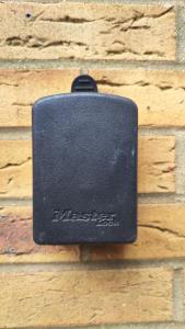 a black box on the side of a brick wall at Quiet Loft Double Room forty-five minutes by train to London Liv Street in Braintree +8 photos