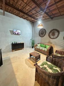 TV/trung tâm giải trí tại Oásis morro branco casa de praia +81 ảnh