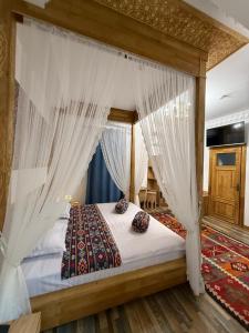 Ένα ή περισσότερα κρεβάτια σε δωμάτιο στο Rizo Boutique