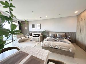 Ένα ή περισσότερα κρεβάτια σε δωμάτιο στο Song's Apartment Near Beach - Căn Hộ Du Lịch TP Biển Vũng Tàu