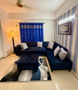 Posezení v ubytování 1BR Cozy Apartment, Diamond Mall & Residencia, Islamabad