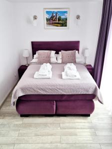 Posteľ alebo postele v izbe v ubytovaní Apartamenty Alcatraz z jacuzzi