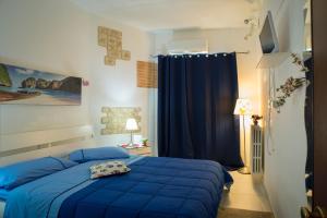 Postel nebo postele na pokoji v ubytování Suites Florence