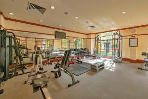 a gym with several treadmills and elliptical machines at Sokha Angkor Resort in Siem Reap