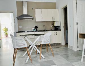 Køkken eller tekøkken på patio de luja centro parking y piscina