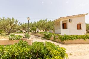 Vonkajšia záhrada v ubytovaní Casale la Macina Residence Scopello
