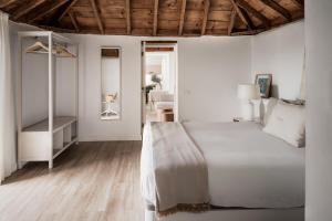 Łóżko lub łóżka w pokoju w obiekcie V&C Luxury Village