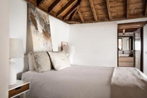 Łóżko lub łóżka w pokoju w obiekcie V&C Luxury Village