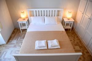 Katil atau katil-katil dalam bilik di Kalogiannis Apartments (AcquaBlue & SunnyShades)