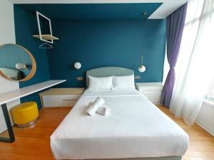 vortex suites klcc by twin tower vibes客房内的一张或多张床位
