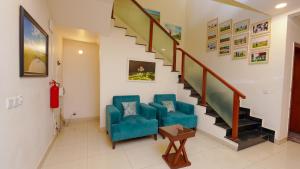 Χώρος καθιστικού στο DHAM Hospitality Inn