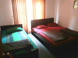 Ένα ή περισσότερα κρεβάτια σε δωμάτιο στο Moon Ridge Holiday Home