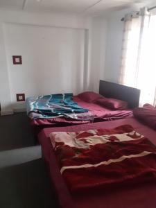 Ένα ή περισσότερα κρεβάτια σε δωμάτιο στο Moon Ridge Holiday Home