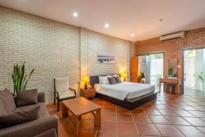 Postel nebo postele na pokoji v ubytování Mekong Long Thanh Resort & Reststop