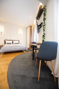 Ένα ή περισσότερα κρεβάτια σε δωμάτιο στο Central Belgrade Apartments