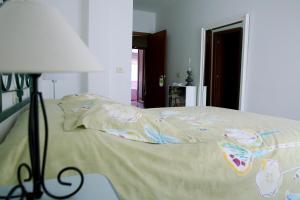 Posteľ alebo postele v izbe v ubytovaní Habitaciones Castelao