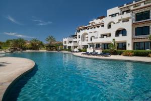 a swimming pool in front of a building at Playa de La Paz by Lumina in La Paz +19 photos