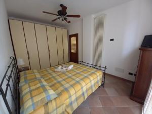 Ένα ή περισσότερα κρεβάτια σε δωμάτιο στο Casa Bambina