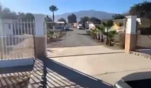 a view of a parking lot with a fence at Casa en maneadero Ensenada in Maneadero