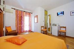 Postel nebo postele na pokoji v ubytování Guest House Villa Jadera