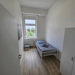 Ένα ή περισσότερα κρεβάτια σε δωμάτιο στο Cozy & warm Apartment in Hanau
