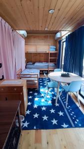 a room with a blue rug with stars on it at Fuji Dome Glamping in Fujikawaguchiko