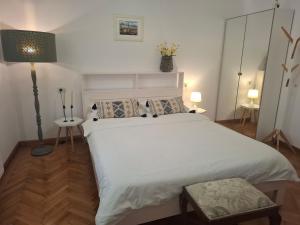 En eller flere senge i et værelse på Casa Bologna