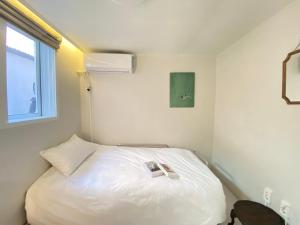 En eller flere senge i et værelse på Stay in EV